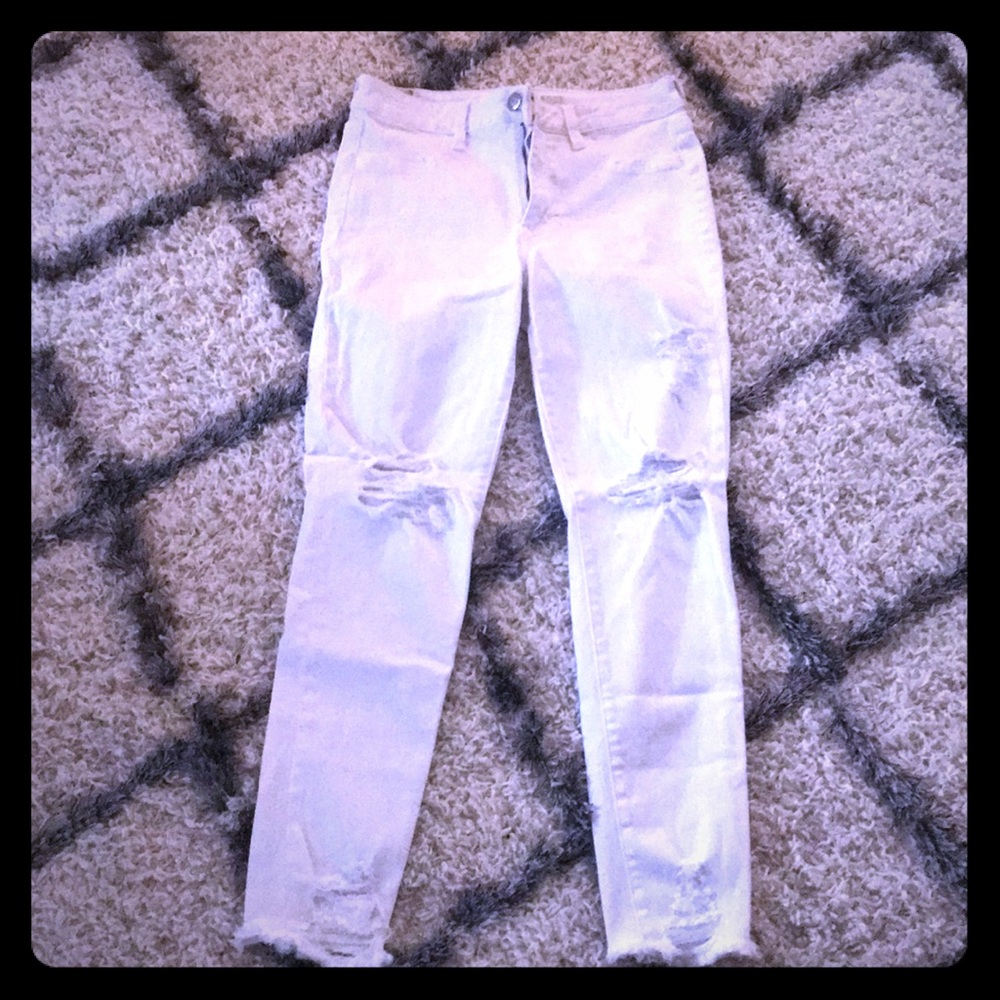 Destructed white skinny jeans